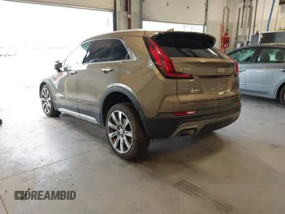 2020 Cadillac XT4 AWD Premium Luxury with VIN 1GYFZDR49LF015590, listed as a IAAI auction lot 41606564 with 47,795 mi miles and . Bid and sale history available at carsss.com. Image 3.