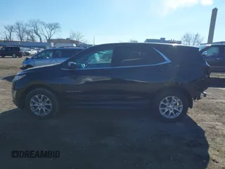2019 Chevrolet Equinox LT z VIN 2GNAXUEV9K6190524, wystawiony jako IAAI lot #41672580 z przebiegiem 94 654 mil mil oraz . Historia ofert i sprzedaży dostępna na DreamBid. Obrazek 13.