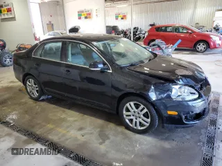 2005 Volkswagen Jetta with VIN 3VWST71KX5M634698, listed as a Copart auction lot 74568524 with 352,048 mi miles and Salvage title. Bid and sale history available at DreamBid. Image 4.