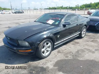 2009 Ford Mustang with VIN 1ZVHT80NX95112192, listed as a IAAI auction lot 42056743 with 141,206 mi miles and . Bid and sale history available at carsss.com. Image 2.