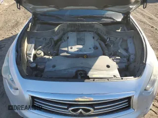 2015 Infiniti QX70 z VIN JN8CS1MW6FM483141, wystawiony jako Copart lot #44126235 z przebiegiem 174 034 mil mil oraz Czysty tytuł • Clean title. Historia ofert i sprzedaży dostępna na DreamBid. Obrazek 12.
