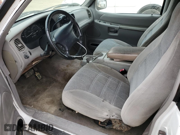 1999 Ford Explorer with VIN 1FMYU22E1XUA94061, listed as a Copart auction lot 44463165 with 172,246 mi miles and Salvage title. Bid and sale history available at DreamBid. Image 7.
