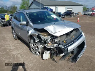 2015 Ford Escape Titanium z VIN 1FMCU9J99FUC75852, wystawiony jako IAAI lot #42171467 z przebiegiem 113 322 mil mil oraz . Historia ofert i sprzedaży dostępna na DreamBid. Obrazek 1.