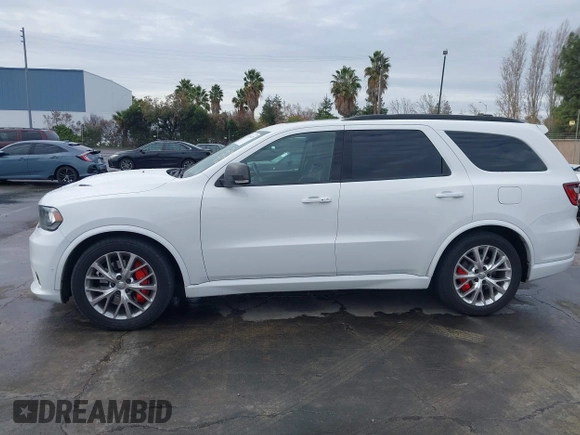 2018 Dodge Durango SRT with VIN 1C4SDJGJ5JC262338, listed as a IAAI auction lot 41106320 with 89,046 mi miles and . Bid and sale history available at DreamBid. Image 14.