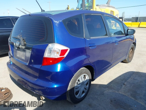 2009 Honda Fit with VIN JHMGE88279S071667, listed as a IAAI auction lot 42035664 with 235,791 mi miles. Bid and sale history available at carsss.com. Image 4.