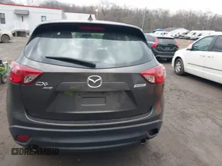 2016 Mazda CX-5 Sport with VIN JM3KE4BY8G0895209, listed as a IAAI auction lot 41688405 with 115,954 mi miles. Bid and sale history available at carsss.com. Image 16.