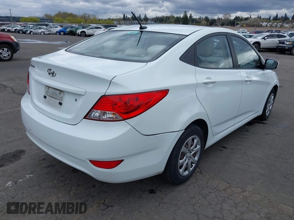 2013 Hyundai Accent GLS with VIN KMHCT4AE6DU291877, listed as a IAAI auction lot 41931876 with 136,781 mi miles. Bid and sale history available at carsss.com. Image 4.
