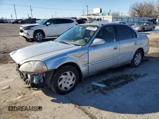 1996 Honda Civic EX with VIN 1HGEJ8644TL027704, listed as a Copart auction lot 88506285 with 296,127 mi miles and Salvage Title. Bid and sale history available at carsss.com. Image 1.