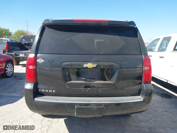 2015 Chevrolet Tahoe LTZ with VIN 1GNSCCKCXFR117525, listed as a IAAI auction lot 41839259 with 143,413 mi miles. Bid and sale history available at carsss.com. Image 17.