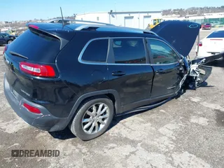 2017 Jeep Cherokee Limited with VIN 1C4PJMDBXHW636173, listed as a IAAI auction lot 41839296 with 92,468 mi miles and . Bid and sale history available at DreamBid. Image 4.