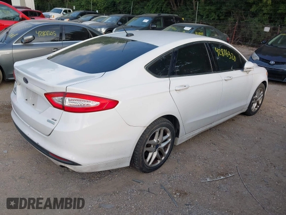 2013 Ford Fusion SE with VIN 3FA6P0HR1DR292942, listed as a IAAI auction lot 42806320 with 203,448 mi miles and . Bid and sale history available at DreamBid. Image 4.
