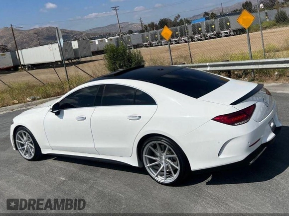 2019 Mercedes-Benz CLS with VIN WDD2J5JB0KA015104, listed as a IAAI auction lot 42108693 with 59,102 mi miles. Bid and sale history available at carsss.com. Image 3.