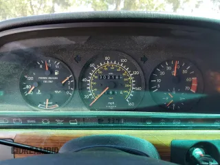 1990 Mercedes-Benz 420 with VIN WDBCA35E6LA549912, listed as a Copart auction lot 69108464 with 302,188 mi miles and Salvage Title. Bid and sale history available at carsss.com. Image 9.