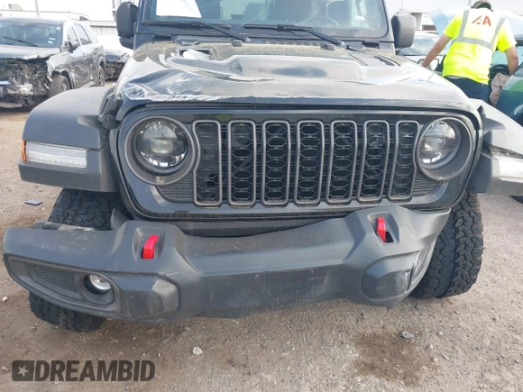 2024 Jeep Wrangler Rubicon with VIN 1C4PJXFG6RW337596, listed as a IAAI auction lot 41958788 with 15,942 mi miles and . Bid and sale history available at DreamBid. Image 6.