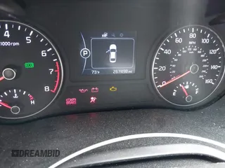 2016 Kia Optima LX z VIN KNAGT4L30G5070000, wystawiony jako IAAI lot #42169747 z przebiegiem 267 498 mil mil oraz . Historia ofert i sprzedaży dostępna na DreamBid. Obrazek 7.
