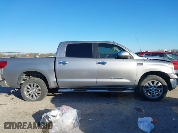 2012 Toyota Tundra 4WD Truck LTD with VIN 5TFHW5F18CX251584, listed as a IAAI auction lot 41054238 with 124,892 mi miles. Bid and sale history available at carsss.com. Image 13.