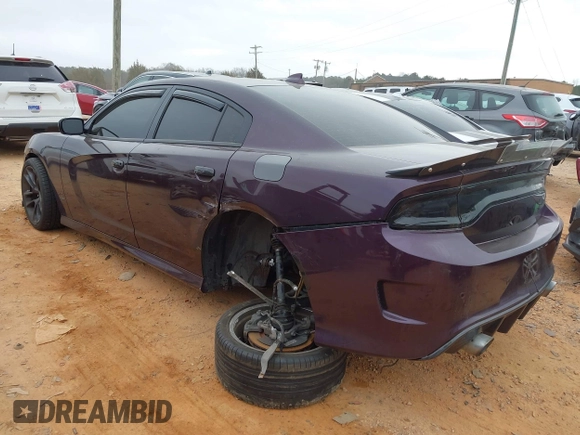 2021 Dodge Charger Scat Pack Widebody with VIN 2C3CDXGJ5MH579324, listed as a IAAI auction lot 41399676 with 77,156 mi miles and . Bid and sale history available at DreamBid. Image 3.