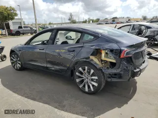 2024 Tesla Model 3 Long Range with VIN 5YJ3E1EB8RF868583, listed as a Copart auction lot 44813275 with 6,805 mi miles and Salvage Title. Bid and sale history available at carsss.com. Image 2.