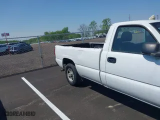 2004 Chevrolet Silverado 1500 Work Truck with VIN 1GCEC14X24Z194557, listed as a IAAI auction lot 42002678 with 116,877 mi miles. Bid and sale history available at carsss.com. Image 6.