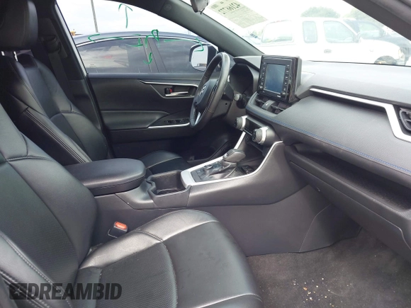 2022 Toyota RAV4 Hybrid SE with VIN 4T3T6RFV4NU065150, listed as a IAAI auction lot 42166772 with 69,868 mi miles and . Bid and sale history available at DreamBid. Image 5.