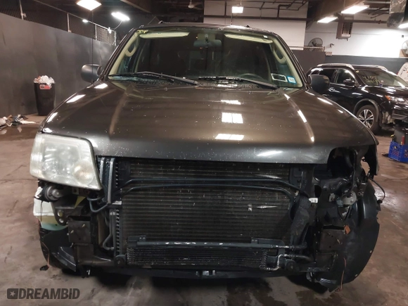 2005 Mercury Mariner Luxury with VIN 4M2YU57115DJ31547, listed as a IAAI auction lot 41565468 with 68,061 mi miles. Bid and sale history available at carsss.com. Image 6.
