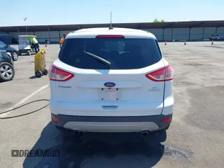 2015 Ford Escape SE z VIN 1FMCU0GX9FUA62790, wystawiony jako IAAI lot #42475851 z przebiegiem 135 697 mil mil oraz . Historia ofert i sprzedaży dostępna na DreamBid. Obrazek 17.
