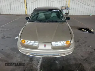 2002 Saturn SL z VIN 1G8ZH52842Z165459, wystawiony jako Copart lot #57273035 z przebiegiem 84 482 mil mil oraz Szkoda całkowita • Salvage title. Historia ofert i sprzedaży dostępna na DreamBid. Obrazek 5.