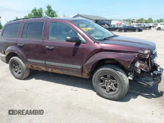 2005 Dodge Durango SXT with VIN 1D4HB38N15F574886, listed as a IAAI auction lot 42274183 with 224,122 mi miles and . Bid and sale history available at DreamBid. Image 14.