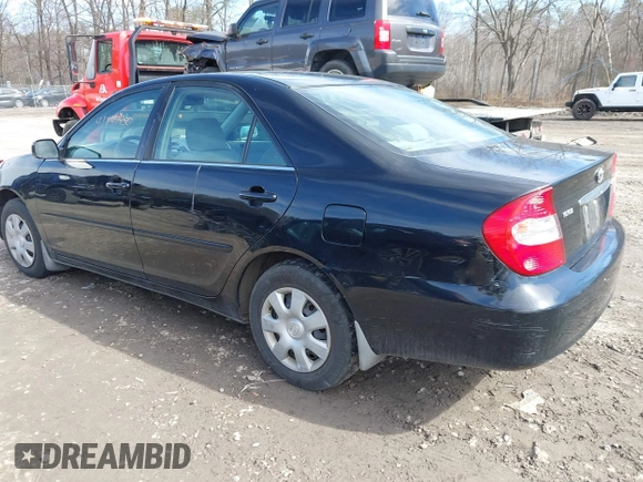 2004 Toyota Camry LE with VIN 4T1BE32K94U307994, listed as a IAAI auction lot 41847450 with 164,016 mi miles and . Bid and sale history available at carsss.com. Image 3.