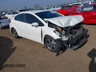 2018 Kia Forte LX z VIN 3KPFL4A72JE263121, wystawiony jako IAAI lot #42326186 z przebiegiem 82 442 mil mil oraz . Historia ofert i sprzedaży dostępna na DreamBid. Obrazek 1.