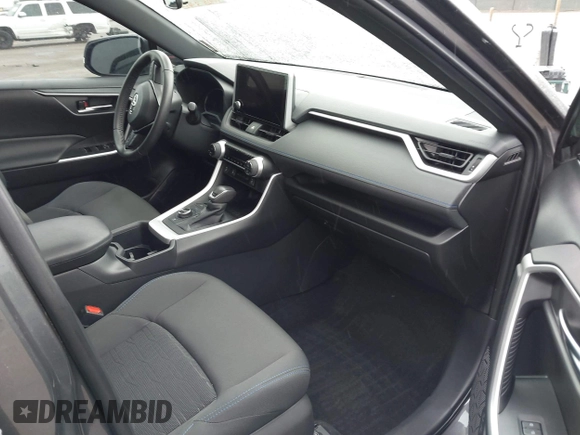2024 Toyota RAV4 Hybrid SE with VIN 2T3T6RFV0RW055852, listed as a IAAI auction lot 41804088 with 36,428 mi miles and . Bid and sale history available at DreamBid. Image 5.