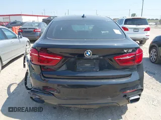 2018 BMW X6 xDrive50i with VIN 5UXKU6C58J0W39038, listed as a IAAI auction lot 40025654 with 106,080 mi miles. Bid and sale history available at carsss.com. Image 16.