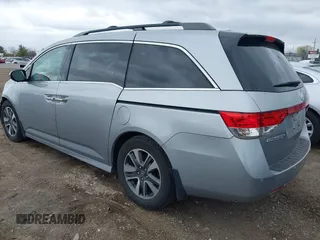 2016 Honda Odyssey Touring Elite with VIN 5FNRL5H99GB107896, listed as a IAAI auction lot 42040395 with 162,120 mi miles and . Bid and sale history available at carsss.com. Image 3.