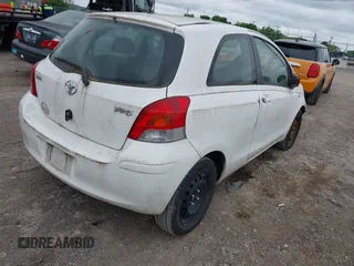 2009 Toyota Yaris with VIN JTDJT903595224746, listed as a IAAI auction lot 42217189 with 183,363 mi miles. Bid and sale history available at carsss.com. Image 4.
