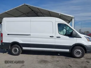 2023 Ford Transit Cargo with VIN 1FTBR1C85PKC08945, listed as a IAAI auction lot 41385685 with 5,577 mi miles and . Bid and sale history available at DreamBid. Image 14.