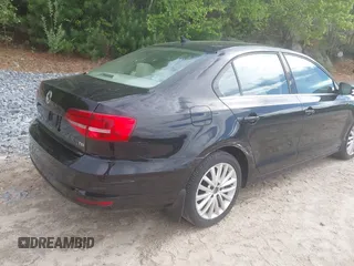 2015 Volkswagen Jetta SE z VIN 3VWD17AJ3FM252584, wystawiony jako IAAI lot #42257546 z przebiegiem 117 195 mil mil oraz . Historia ofert i sprzedaży dostępna na DreamBid. Obrazek 4.