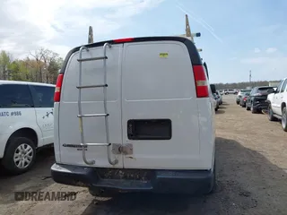 2014 Chevrolet Express Cargo Van with VIN 1GCWGFCA7E1110011, listed as a IAAI auction lot 41983301 with 114,827 mi miles. Bid and sale history available at carsss.com. Image 16.