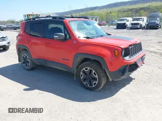 2016 Jeep Renegade Trailhawk z VIN ZACCJBCT1GPC81886, wystawiony jako IAAI lot #42102154 z przebiegiem 98 313 mil mil oraz . Historia ofert i sprzedaży dostępna na DreamBid. Obrazek 1.