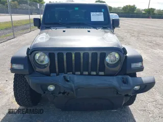 2019 Jeep Wrangler Unlimited Sport S z VIN 1C4HJXDN9KW636592, wystawiony jako IAAI lot #42159099 z przebiegiem 82 580 mil mil oraz . Historia ofert i sprzedaży dostępna na DreamBid. Obrazek 13.