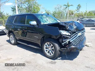 2022 Chevrolet Tahoe Premier with VIN 1GNSCSKDXNR362584, listed as a IAAI auction lot 41853100 with 34,405 mi miles and . Bid and sale history available at DreamBid. Image 1.