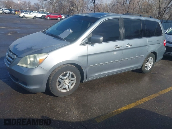 2006 Honda Odyssey EX-L with VIN 5FNRL386X6B018587, listed as a IAAI auction lot 41725966 with 168,215 mi miles. Bid and sale history available at carsss.com. Image 2.