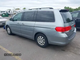 2009 Honda Odyssey EX-L with VIN 5FNRL38629B033203, listed as a IAAI auction lot 42172416 with 261,270 mi miles. Bid and sale history available at carsss.com. Image 3.