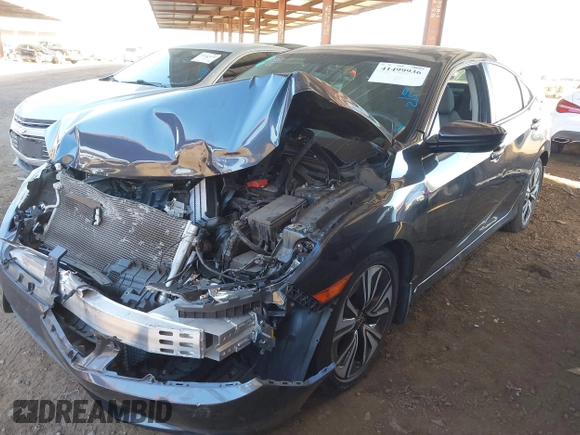 2017 Honda Civic Sedan EX-T with VIN 19XFC1F31HE025632, listed as a IAAI auction lot 41499936 with 71,118 mi miles. Bid and sale history available at carsss.com. Image 2.