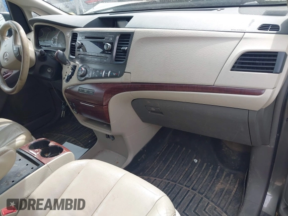 2012 Toyota Sienna XLE AAS with VIN 5TDYK3DC1CS199113, listed as a IAAI auction lot 42123757 with 211,723 mi miles and . Bid and sale history available at carsss.com. Image 5.