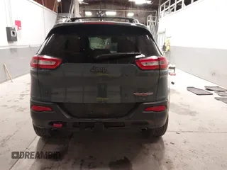 2015 Jeep Cherokee Trailhawk with VIN 1C4PJMBS6FW724931, listed as a IAAI auction lot 41602181 with 153,340 mi miles and . Bid and sale history available at carsss.com. Image 17.