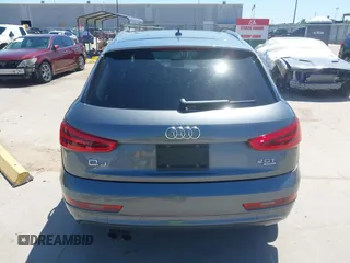 2015 Audi Q3 Prestige with VIN WA1GFCFS7FR013818, listed as a IAAI auction lot 41975076 with 60,295 mi miles and . Bid and sale history available at DreamBid. Image 17.