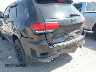 2015 Jeep Grand Cherokee Summit with VIN 1C4RJFJM1FC867861, listed as a IAAI auction lot 42034207 with 92,205 mi miles and . Bid and sale history available at DreamBid. Image 6.