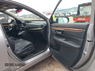 2017 Honda CR-V EX-L with VIN 2HKRW2H8XHH626231, listed as a IAAI auction lot 41979671 with 99,031 mi miles. Bid and sale history available at carsss.com. Image 5.
