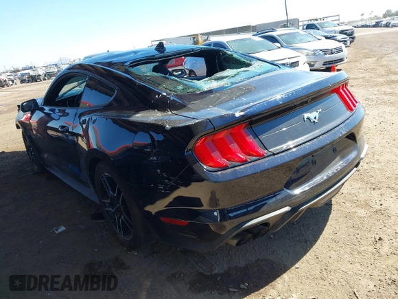 2021 Ford Mustang EcoBoost with VIN 1FA6P8TH2M5104154, listed as a IAAI auction lot 41869810 with 15,561 mi miles and . Bid and sale history available at DreamBid. Image 3.