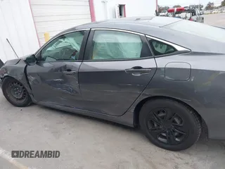 2020 Honda Civic LX with VIN 2HGFC2F63LH530442, listed as a IAAI auction lot 42071650 with 38,520 mi miles and . Bid and sale history available at DreamBid. Image 6.